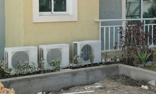 Daikin outdoor HVAC condenser units installed at a residential property in Tucson, AZ